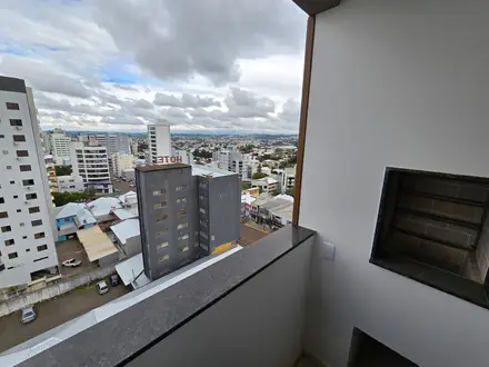 Sacada com churrasqueira e vista